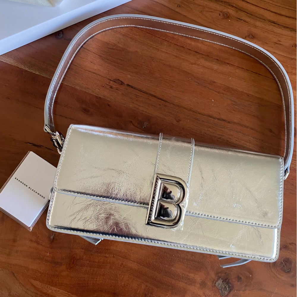 Brand New silver leather Brandon Blackwood baguette